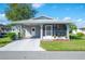 Cozy single-story home with carport and screened porch at 4829 Colonnades E Cir, Lakeland, FL 33811