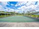 Expansive community shuffleboard courts under covered areas at 4829 Colonnades E Cir, Lakeland, FL 33811