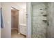 Clean bathroom with shower, vanity, and linen closet at 4829 Colonnades E Cir, Lakeland, FL 33811