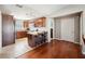 Open concept kitchen with island and breakfast bar at 4829 Colonnades E Cir, Lakeland, FL 33811