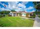 Brick community center with a covered entrance and landscaping at 4829 Colonnades E Cir, Lakeland, FL 33811