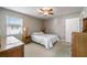 Comfortable bedroom with a full bed and nightstands at 4829 Colonnades E Cir, Lakeland, FL 33811