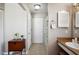 View down a hallway to a bathroom at 4829 Colonnades E Cir, Lakeland, FL 33811