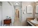 View down a hallway to a bathroom at 4829 Colonnades E Cir, Lakeland, FL 33811