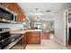 Kitchen with stainless steel appliances and an open concept design at 4829 Colonnades E Cir, Lakeland, FL 33811