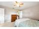 Bright bedroom featuring a double bed and built-in dresser at 4829 Colonnades E Cir, Lakeland, FL 33811