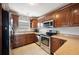 Updated kitchen, stainless steel appliances, and ample cabinet space at 4829 Colonnades E Cir, Lakeland, FL 33811