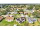 House with solar panels, situated in a residential neighborhood at 7454 Briarbay Loop, Lakeland, FL 33810