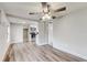 Bright living room with hardwood floors and ceiling fan at 2429 Lakeview St, Lakeland, FL 33801