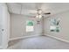 Bright bedroom with neutral walls and plush carpeting at 2429 Lakeview St, Lakeland, FL 33801