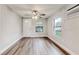 Spacious living room featuring hardwood floors and a view of the front yard at 2429 Lakeview St, Lakeland, FL 33801
