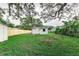 Backyard with shed and wooden fence at 2429 Lakeview St, Lakeland, FL 33801