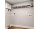 Laundry area with shelving and hookups for a washer and dryer at 2429 Lakeview St, Lakeland, FL 33801