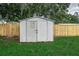 White storage shed in backyard at 2429 Lakeview St, Lakeland, FL 33801