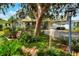 House with a mailbox and lush landscaping at 1819 Meadowbrook Ave, Lakeland, FL 33803