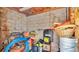 Unfinished basement area with storage items at 4390 Sunnyside Dr, Lakeland, FL 33810