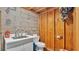 Small basement bathroom with toilet and sink at 4390 Sunnyside Dr, Lakeland, FL 33810