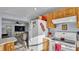 Well-equipped kitchen with open layout to living room at 4390 Sunnyside Dr, Lakeland, FL 33810