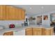 Bright kitchen with wood cabinets and ample counter space at 4390 Sunnyside Dr, Lakeland, FL 33810