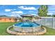 Above ground pool with stone border at 4390 Sunnyside Dr, Lakeland, FL 33810
