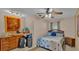 Bedroom with a ceiling fan and a view at 4390 Sunnyside Dr, Lakeland, FL 33810