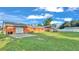Spacious backyard with large lawn and shed at 4390 Sunnyside Dr, Lakeland, FL 33810