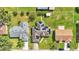 Aerial image showing home's roofline, landscaping and neighborhood context at 7454 Briarbay Loop, Lakeland, FL 33810