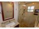 Modern bathroom with granite countertop and glass shower at 4428 Sugartree E Dr, Lakeland, FL 33813