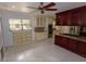Kitchen with granite countertops and wood cabinets at 4428 Sugartree E Dr, Lakeland, FL 33813