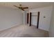 Bedroom with carpet flooring and built-in shelving at 4428 Sugartree E Dr, Lakeland, FL 33813