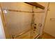Large walk-in shower with glass enclosure and tiled walls at 4428 Sugartree E Dr, Lakeland, FL 33813