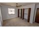 Spacious bedroom with carpet floors and double closets at 4428 Sugartree E Dr, Lakeland, FL 33813