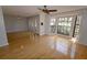 Spacious living room with hardwood floors and abundant natural light at 4428 Sugartree E Dr, Lakeland, FL 33813
