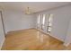 Bright dining room features hardwood floors and large windows at 4428 Sugartree E Dr, Lakeland, FL 33813
