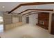 Living room with built-in shelving and fireplace at 4428 Sugartree E Dr, Lakeland, FL 33813