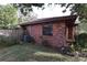 Brick home side view, AC unit visible at 4428 Sugartree E Dr, Lakeland, FL 33813