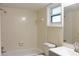 Clean bathroom with tub, toilet and vanity at 608 Lark Dr, Lakeland, FL 33813