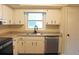 Modern kitchen with stainless steel appliances and granite countertops at 608 Lark Dr, Lakeland, FL 33813