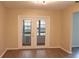 Bright dining room with sliding glass doors leading to a sunroom at 608 Lark Dr, Lakeland, FL 33813