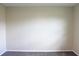 Simple bedroom with neutral walls and carpet at 608 Lark Dr, Lakeland, FL 33813
