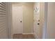 Bright entryway with white doors and light walls at 608 Lark Dr, Lakeland, FL 33813