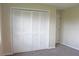 Bedroom with a large closet and neutral decor at 608 Lark Dr, Lakeland, FL 33813