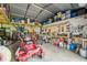 Organized garage with shelving and workshop tools at 8775 Viking Ln, Lakeland, FL 33809