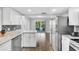 Modern kitchen with stainless steel appliances and granite countertops at 2233 20Th Nw St, Winter Haven, FL 33881