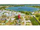 Aerial view of property near lake and community at 2233 20Th Nw St, Winter Haven, FL 33881