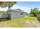 Side view of house exterior, showcasing backyard at 2233 20Th Nw St, Winter Haven, FL 33881