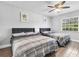 Bedroom with two queen beds and ceiling fan at 2233 20Th Nw St, Winter Haven, FL 33881