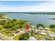 Aerial view of property near lake and community at 2233 20Th Nw St, Winter Haven, FL 33881