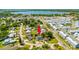 Aerial view of property near lake and community at 2233 20Th Nw St, Winter Haven, FL 33881