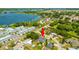 Aerial view of property near lake and community at 2233 20Th Nw St, Winter Haven, FL 33881